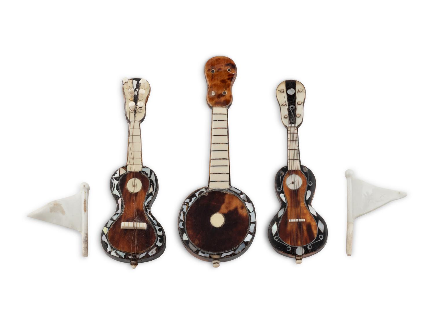 A Group of Three Continental Bone and Tortoise Shell Miniature Stringed Instruments