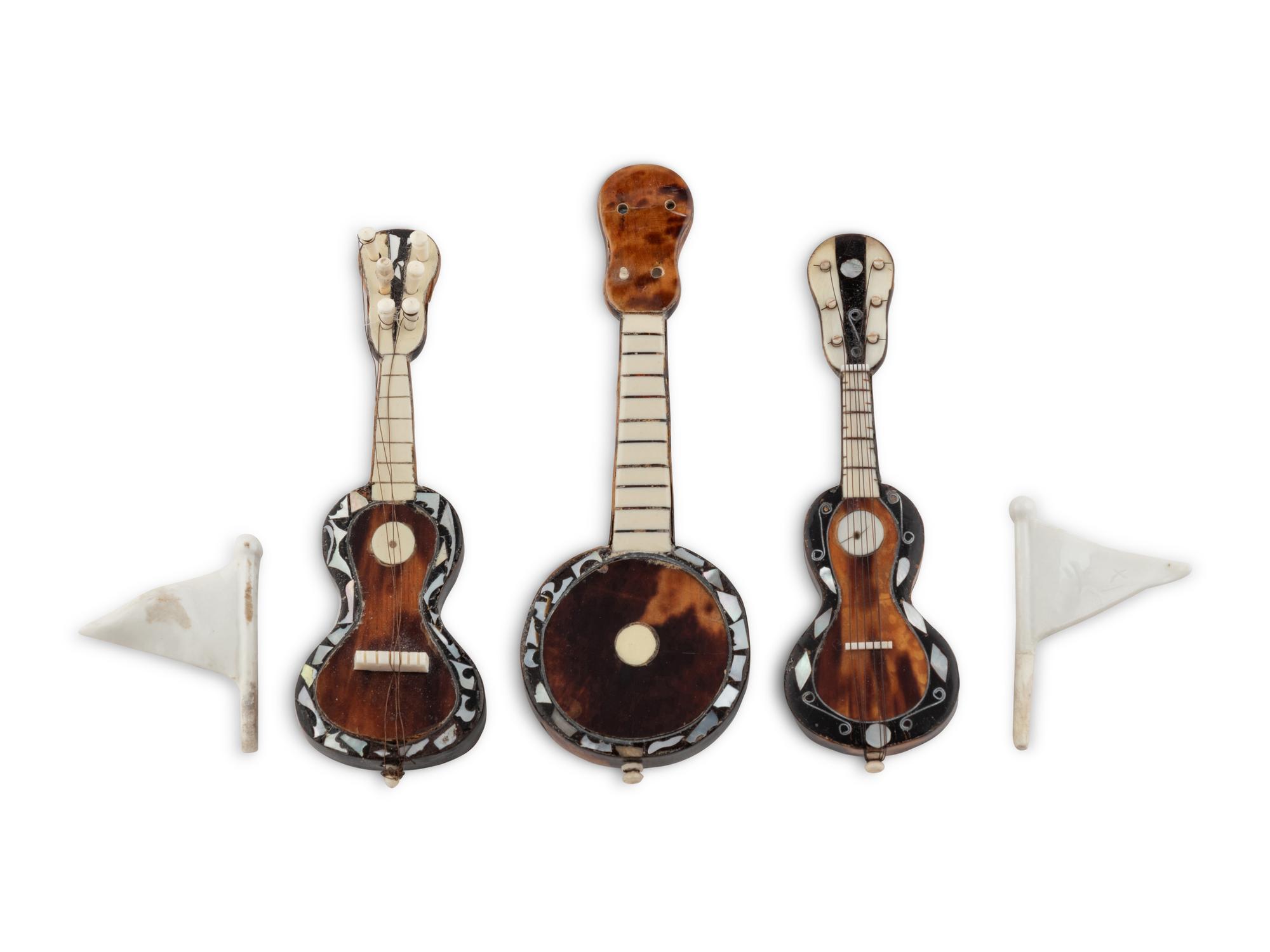 A Group of Three Continental Bone and Tortoise Shell Miniature Stringed Instruments