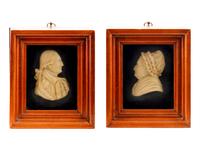 A Pair of Wax Portrait Busts of George and Martha Washington