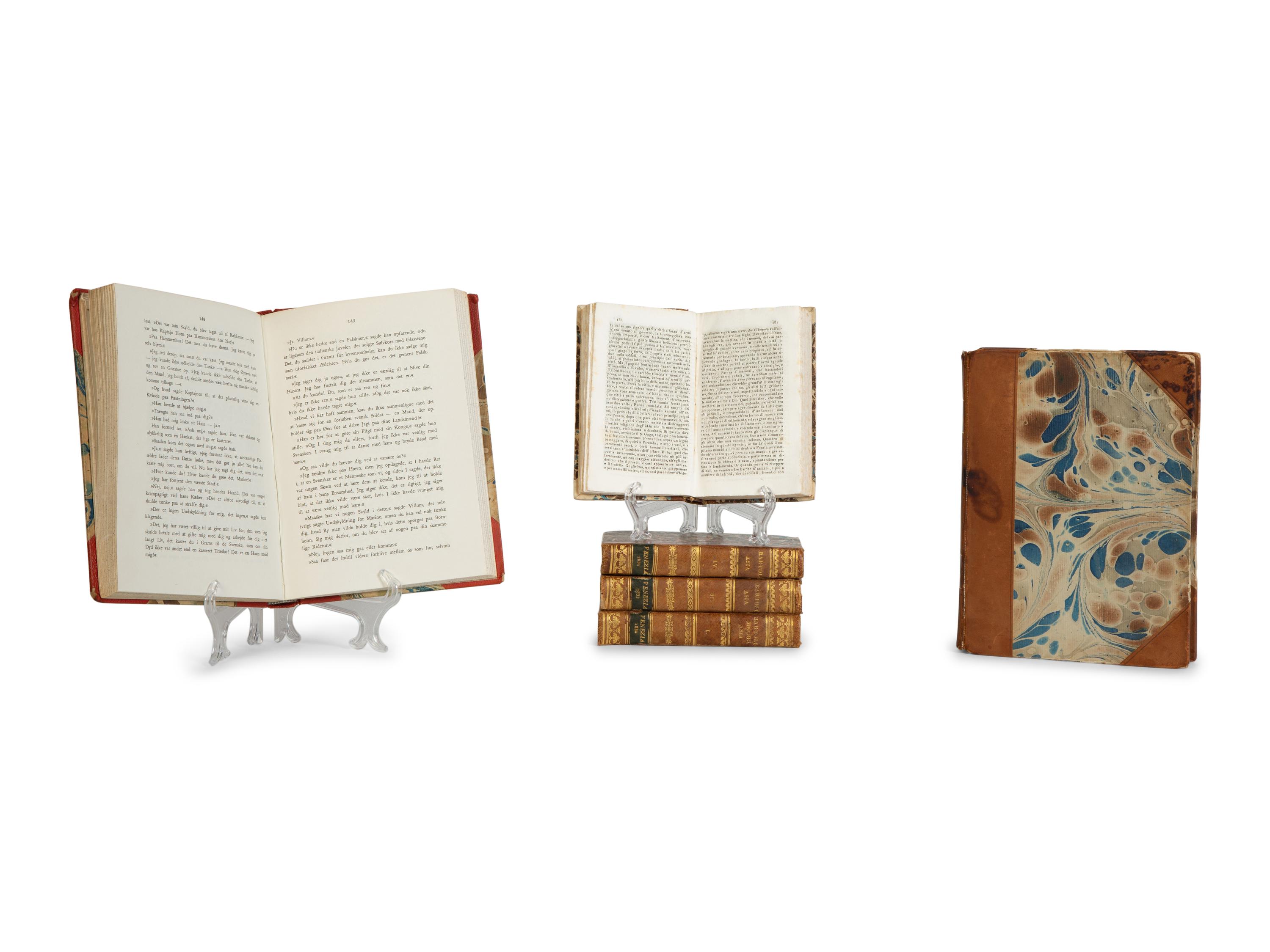 Six Gilt-Tooled Leather Books with Marbled Boards