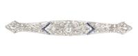 A Platinum, Diamond and Synthetic Sapphire Bar Brooch, 6.40 dwts.