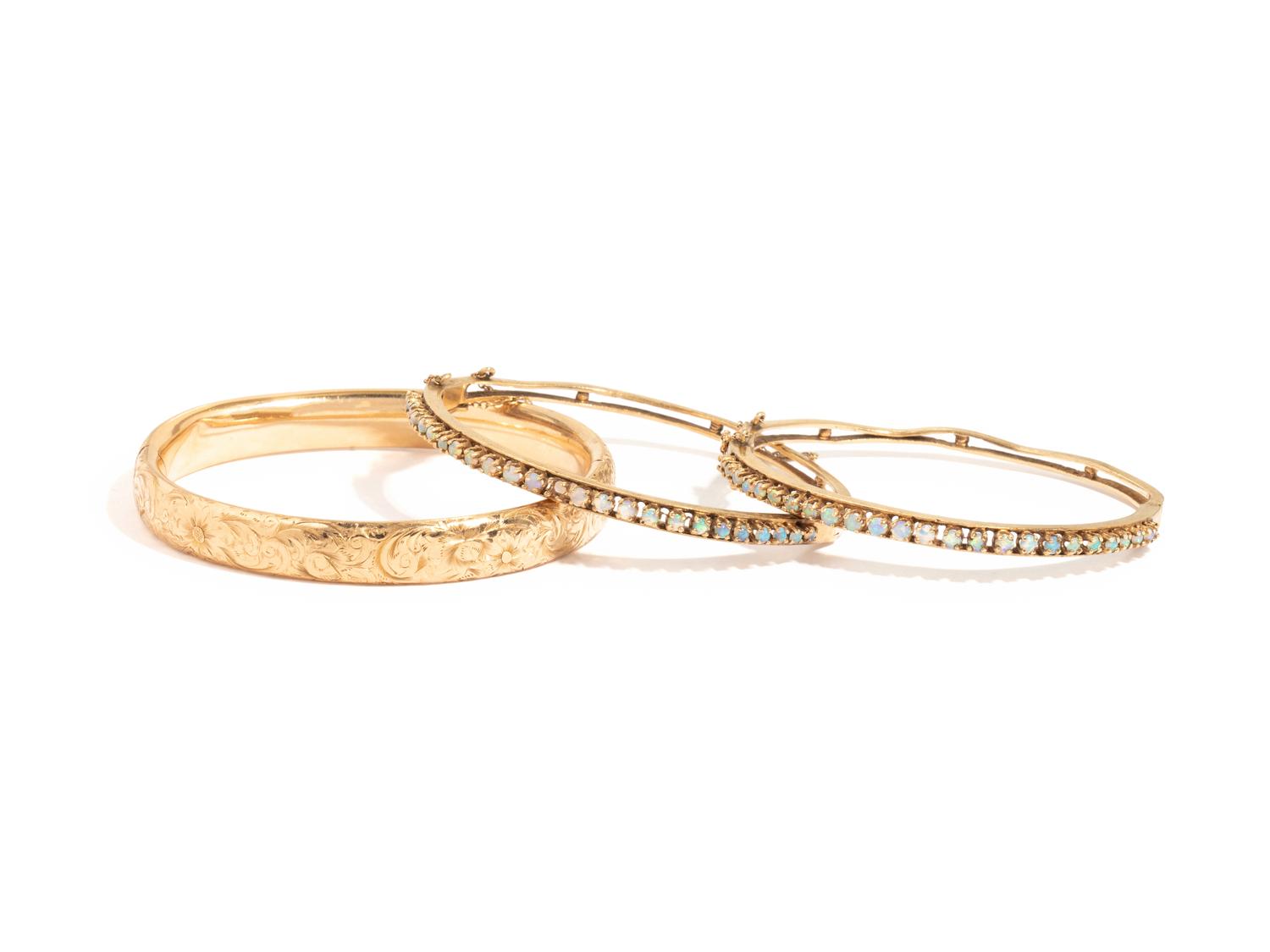 COLLECTION OF YELLOW GOLD BANGLE BRACELETS