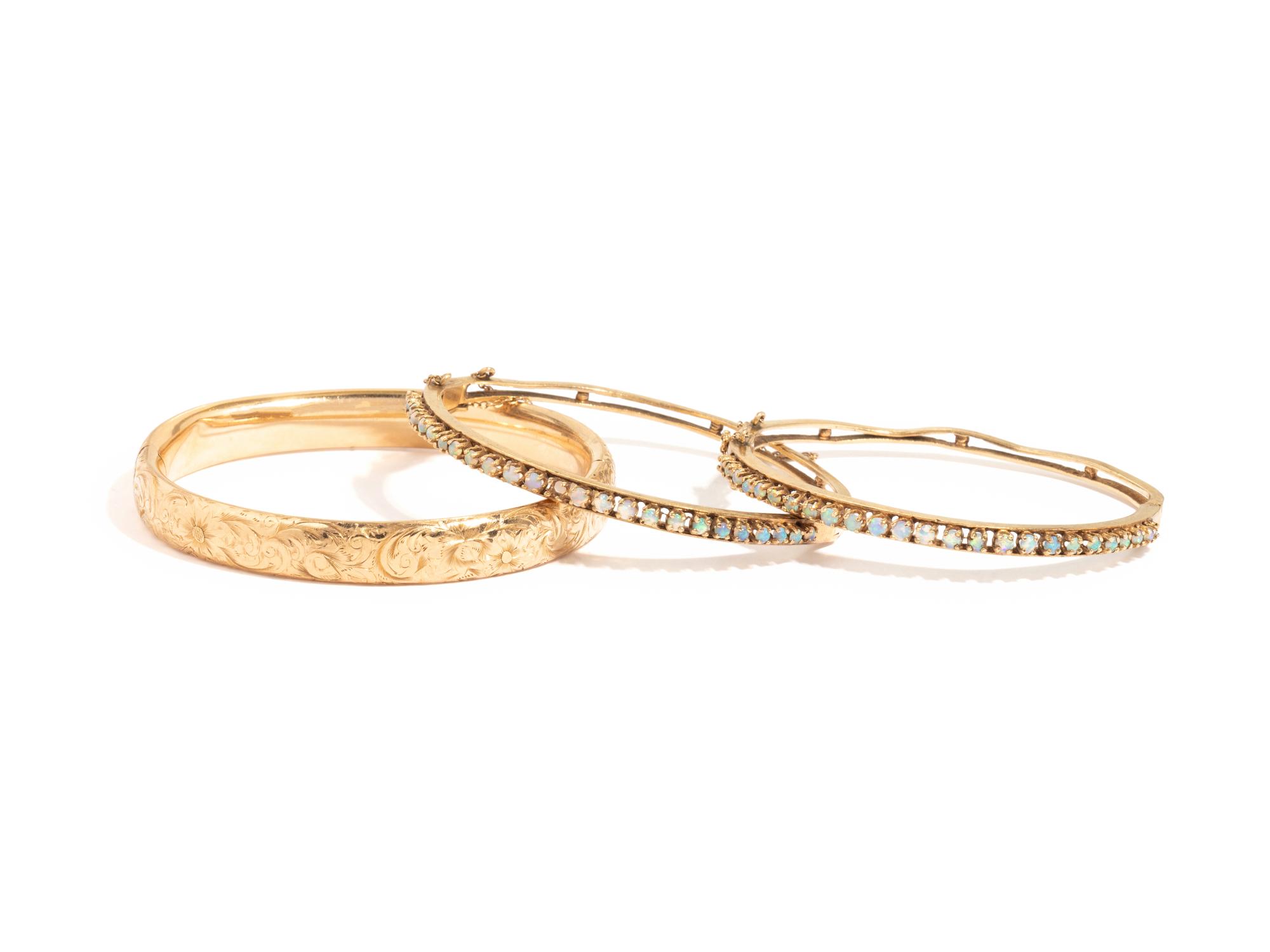 COLLECTION OF YELLOW GOLD BANGLE BRACELETS