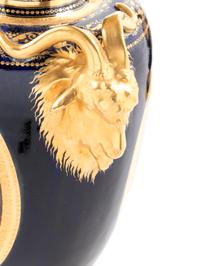 A Pair of Vienna Painted and Parcel Gilt Handled Porcelain Urns