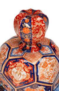 A Pair of Japanese Imari Porcelain Jars and Covers — 19TH CENTURY