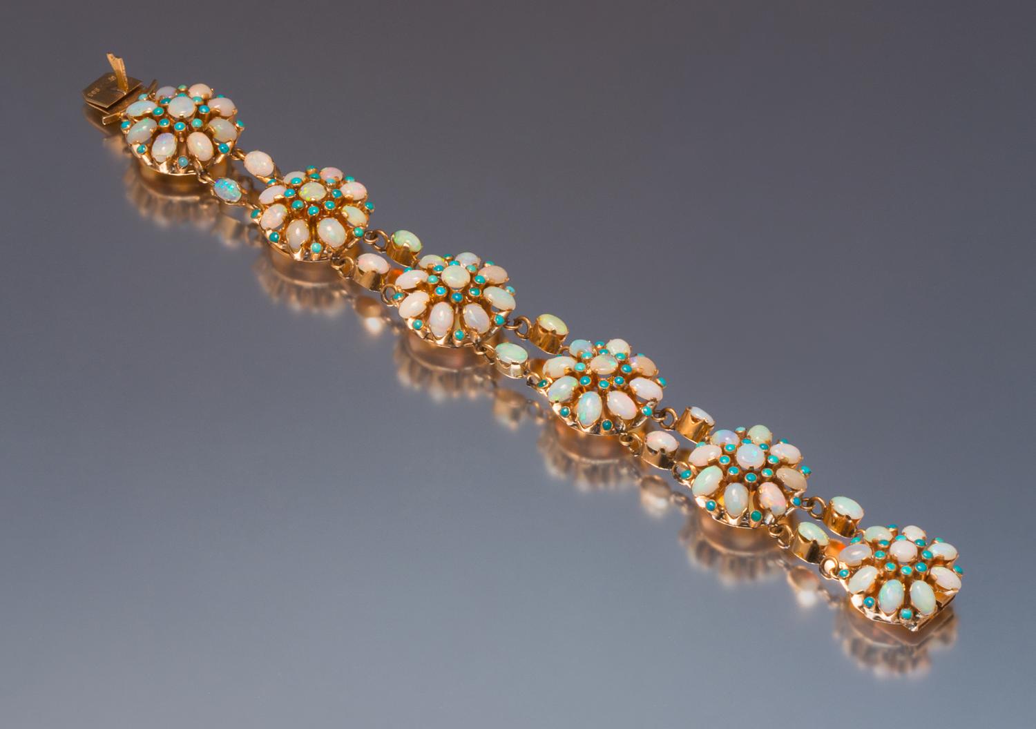 A 14 Karat Rose Gold, Opal, and Turquoise Bracelet, 19.90 dwts.
