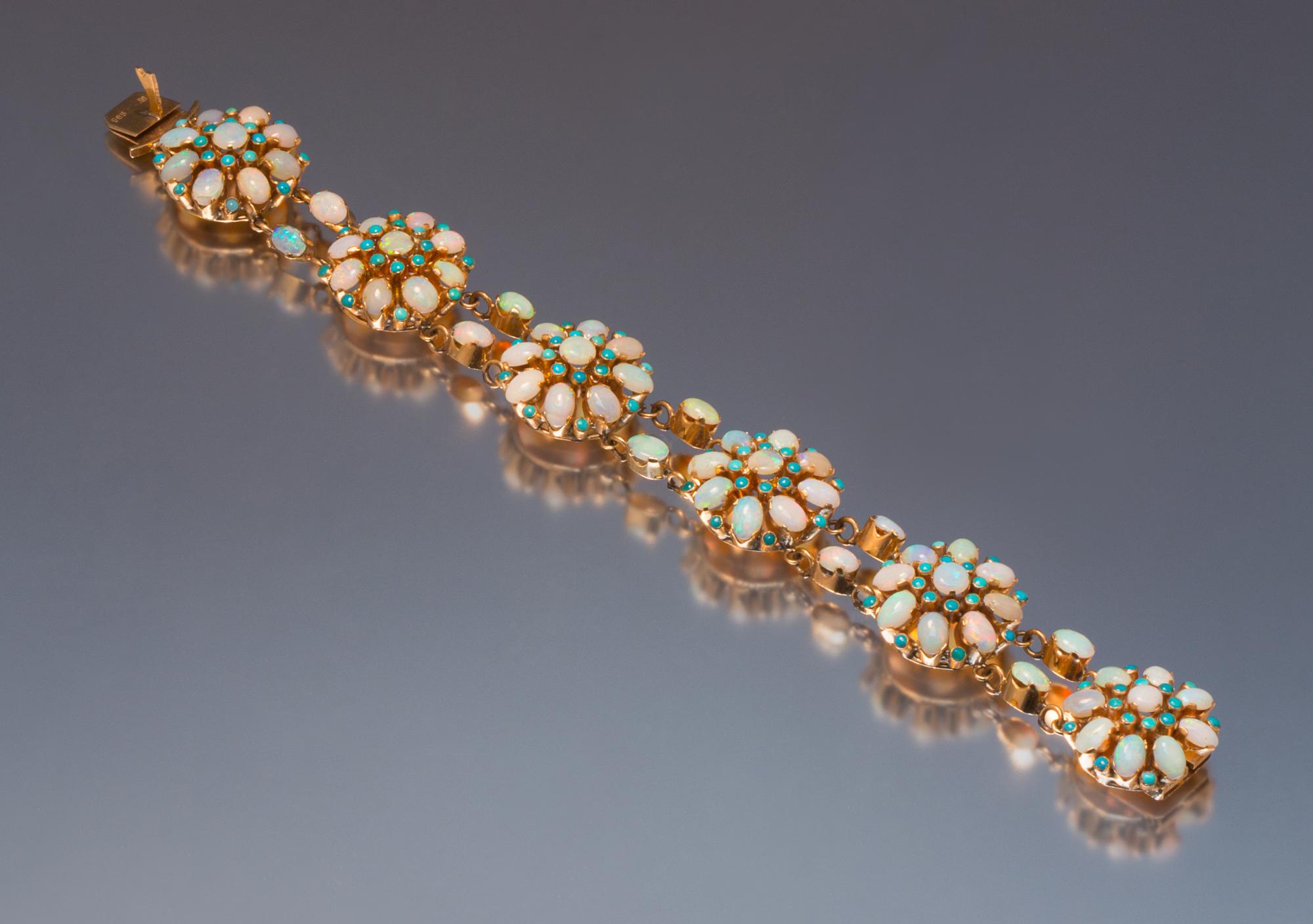 A 14 Karat Rose Gold, Opal, and Turquoise Bracelet, 19.90 dwts.