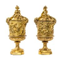 A Pair of Neoclassical Gilt Bronze Covered Urns, Height 15 inches.