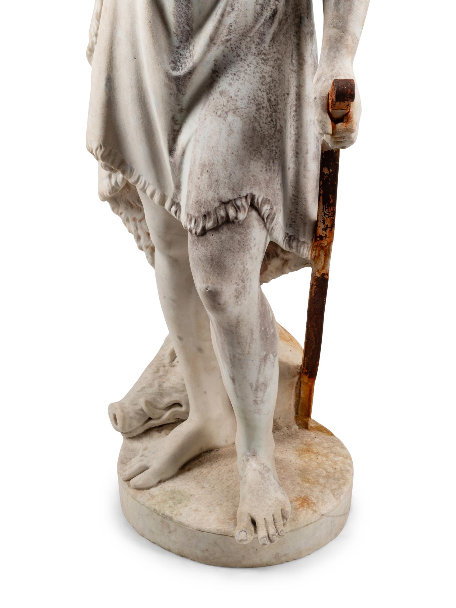 A Continental Marble and Iron Figure of an Archer with a Boar’s Head