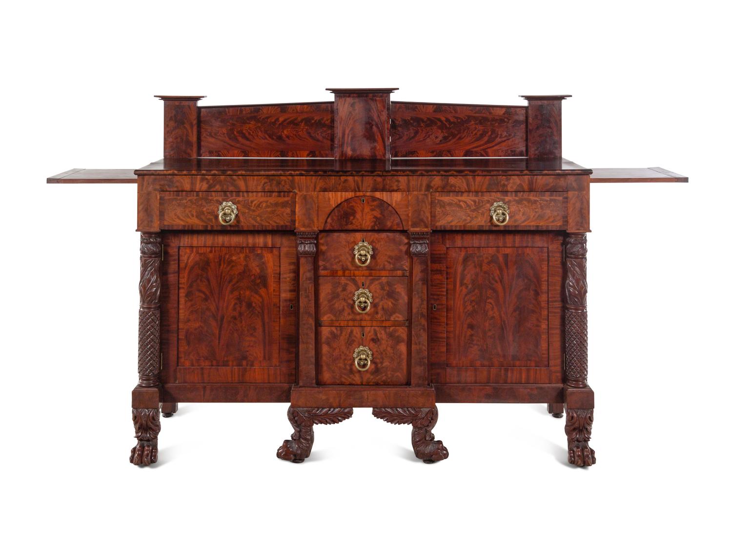 A Late Classical Carved and Highly Figured Mahogany Sideboard
