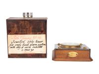 An American Bank Protection Co. Electric Time Clock and a Waltham Correct Time Wall Clock