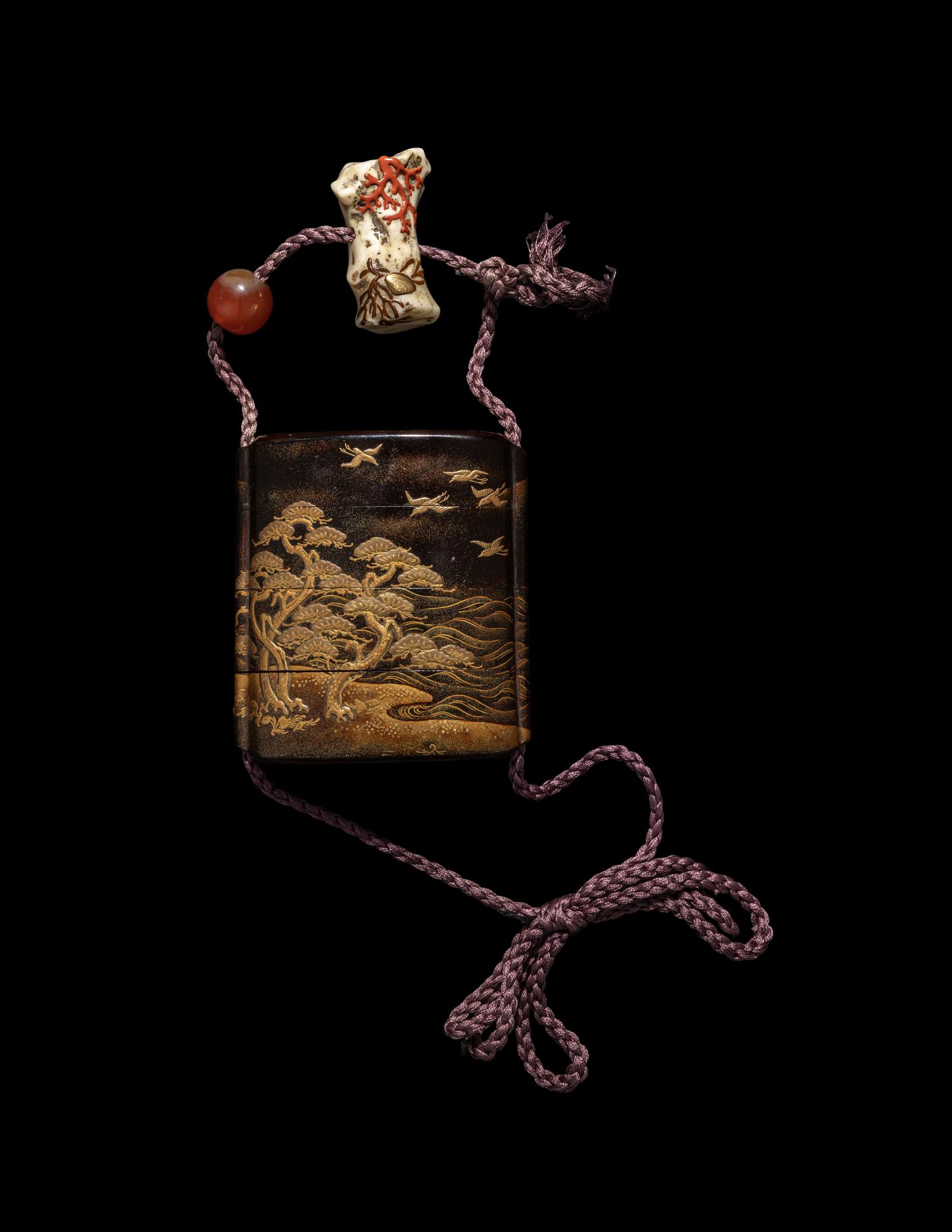 A Japanese Gold and Black Lacquer Three-Case Inro