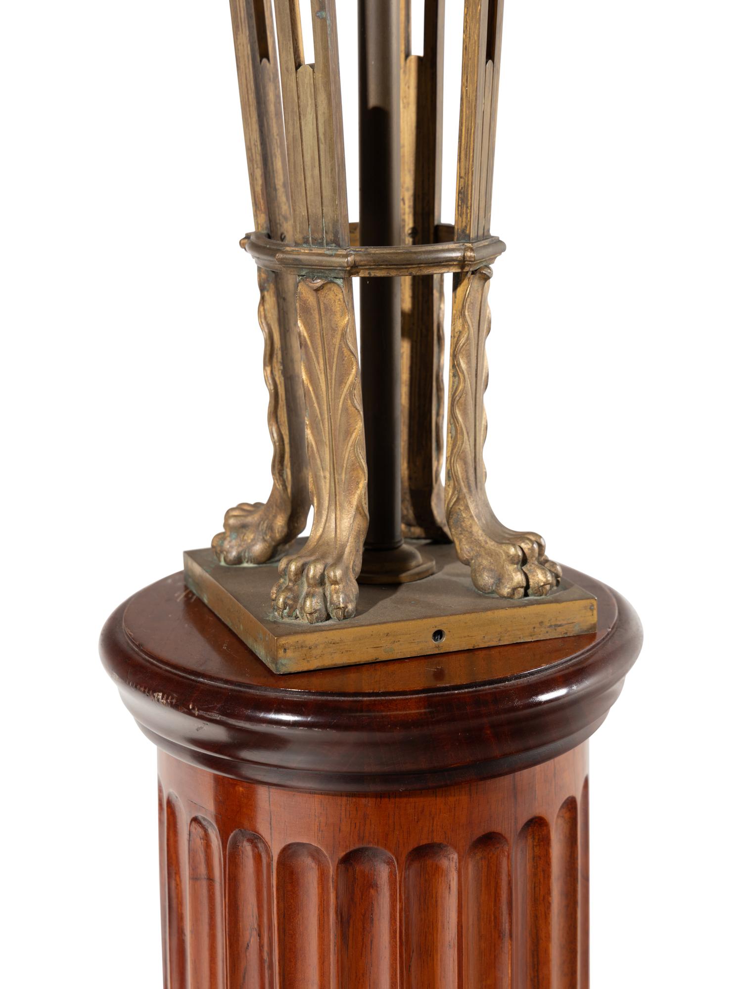 A Pair of Neoclassical Gilt Bronze Seven-Light Candelabra