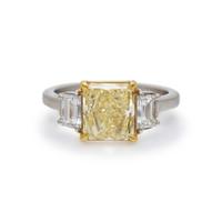 FANCY YELLOW DIAMOND AND DIAMOND RING