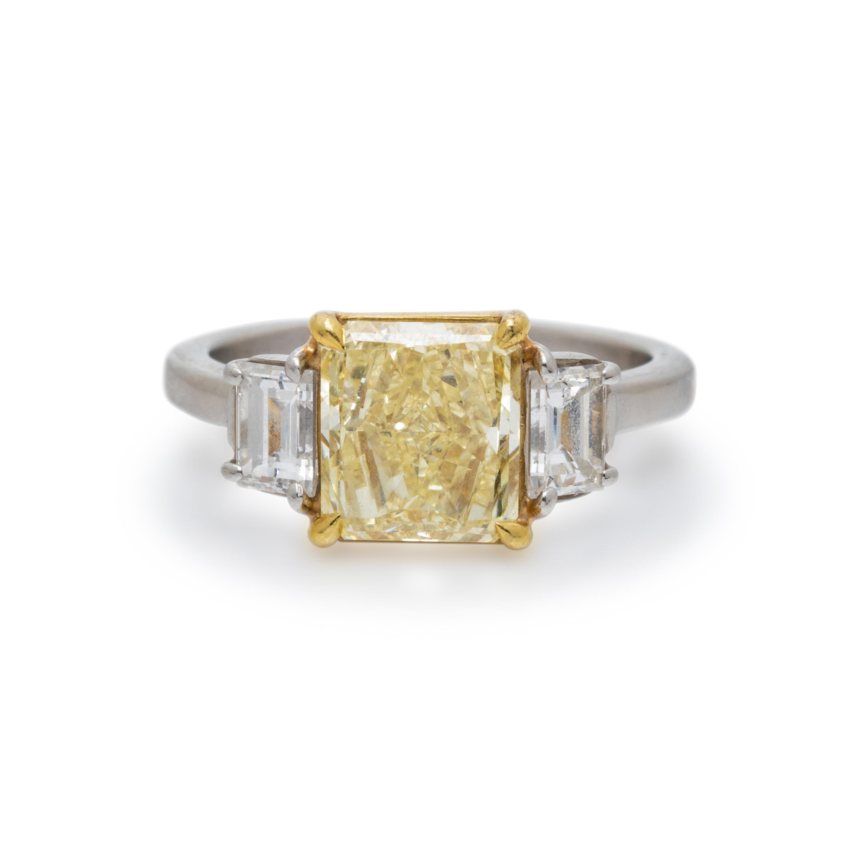FANCY YELLOW DIAMOND AND DIAMOND RING