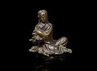 A small Chinese patinated bronze figure of Guanyin seated, 17th/18th century 加漆觀音銅塑 十七或十八世紀