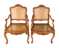 A Pair of Louis XV Style Carved Walnut Fauteuils — LATE 19TH CENTURY