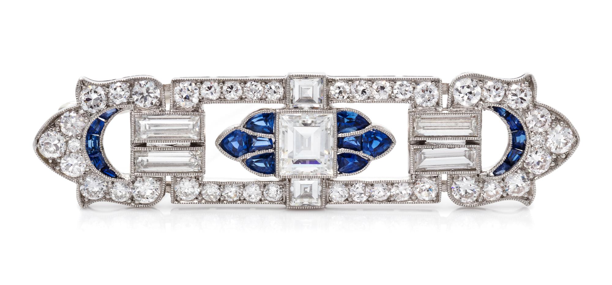 An Art Deco Platinum, Diamond and Sapphire Brooch,