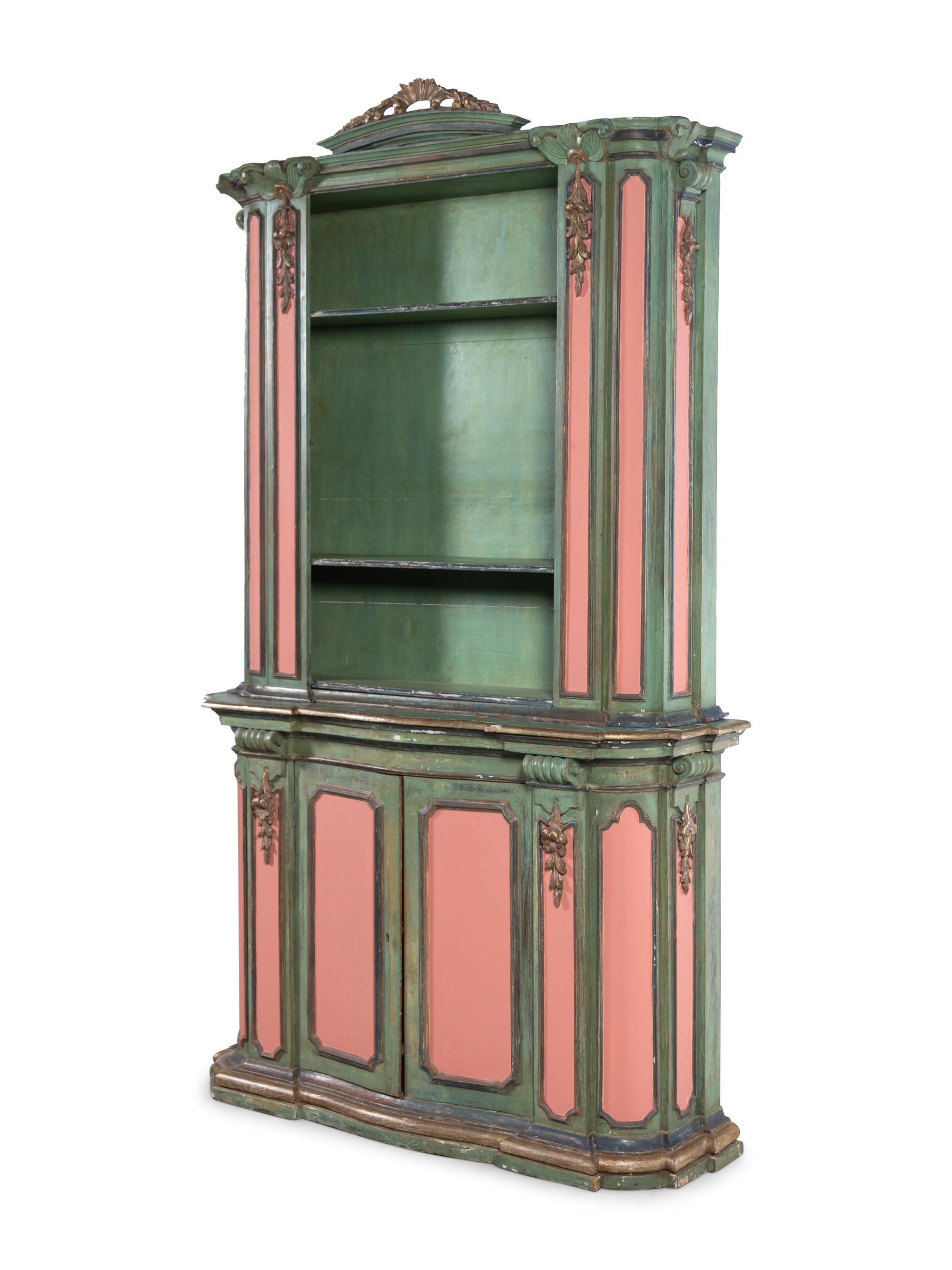 An Italian Baroque Style Painted and Parcel Gilt Bookcase