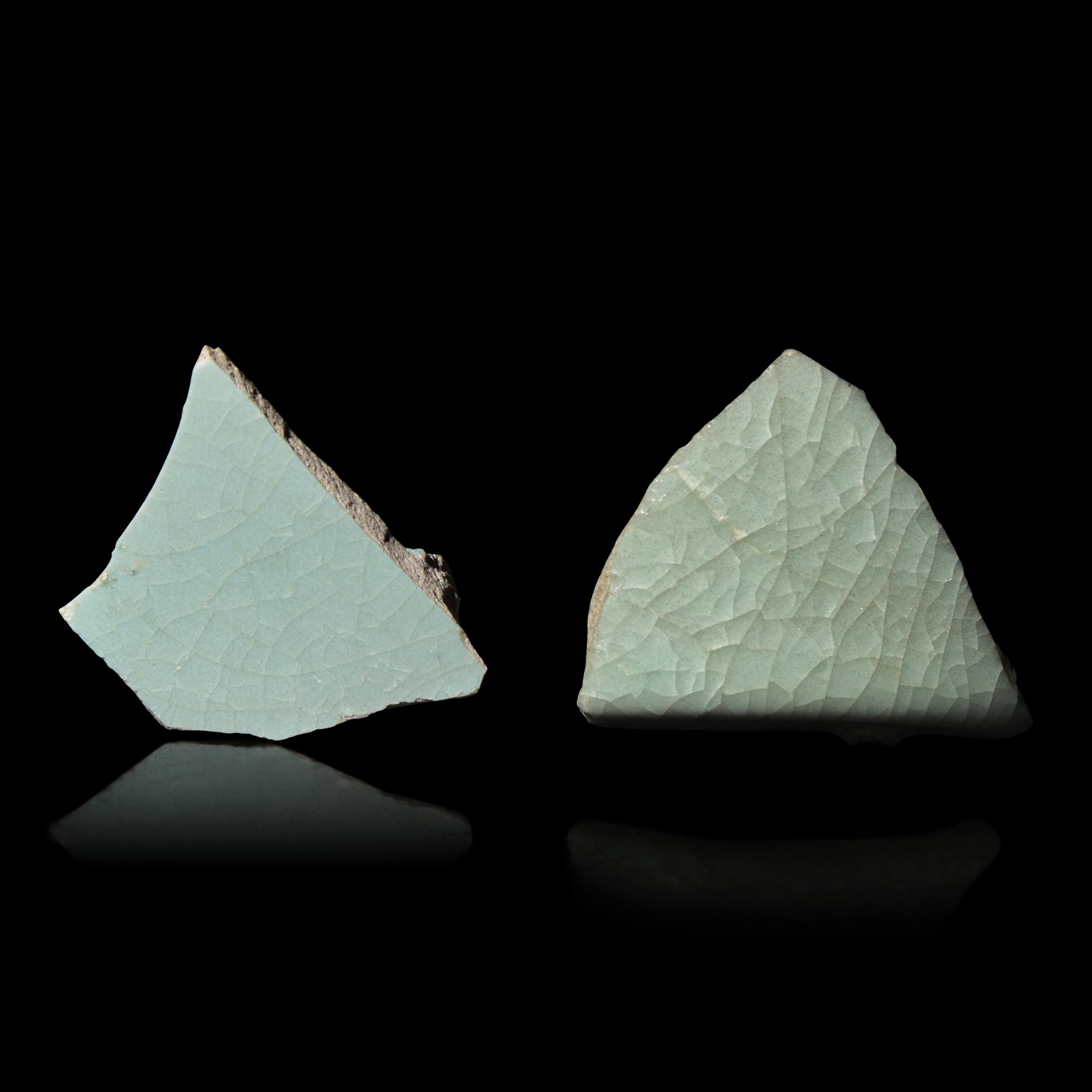 Two Chinese Celadon Glazed Ceramic Fragments, Song Dynasty — 宋 汝窯及官窯帶支釘瓷片兩枚