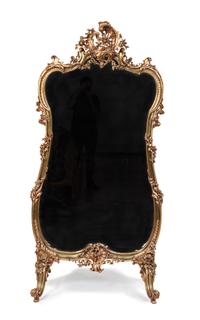 A Louis XV Style Giltwood Cheval Mirror Height 58 1/2 x width 34 1/2 inches.