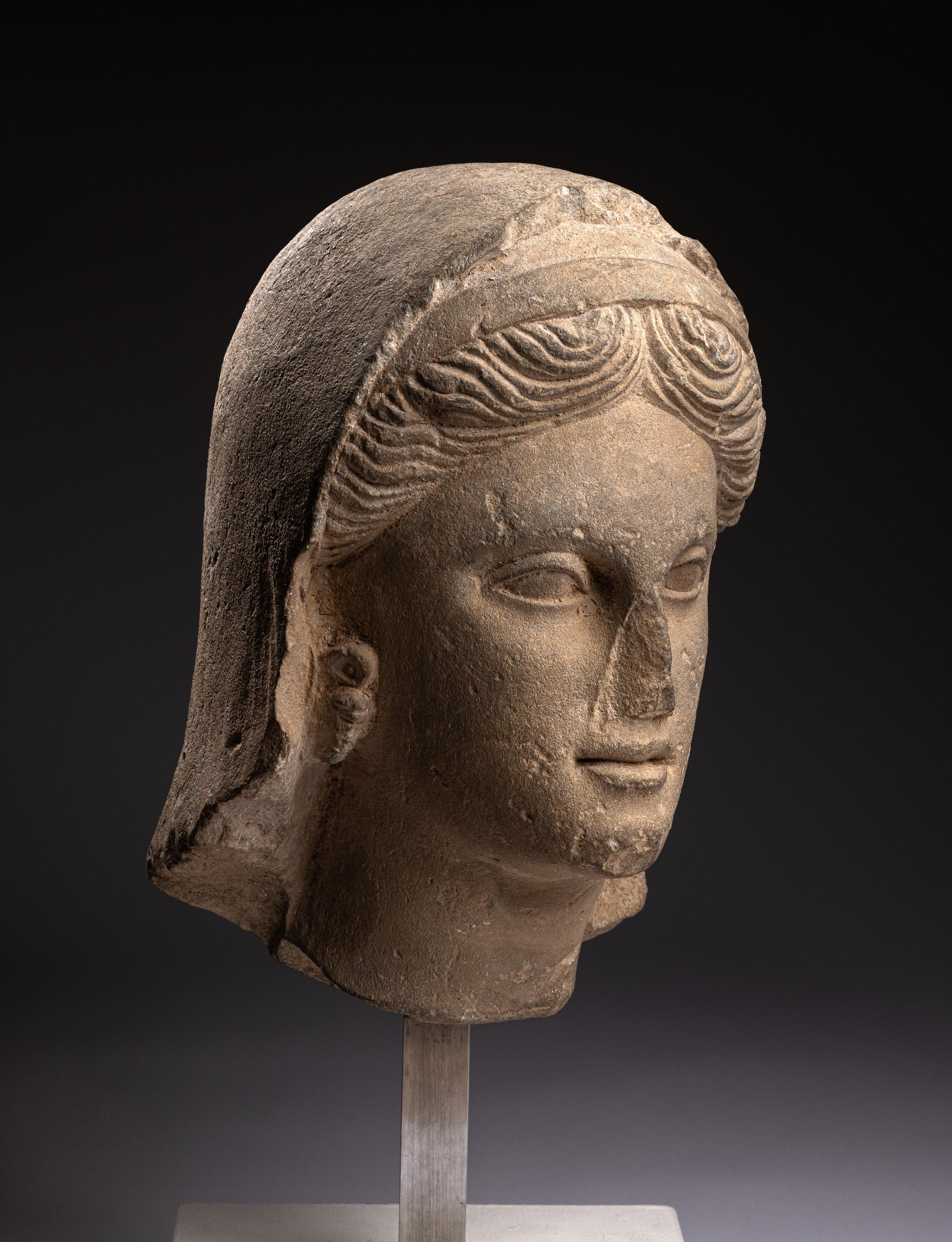 A Greek Limestone Head of a Woman