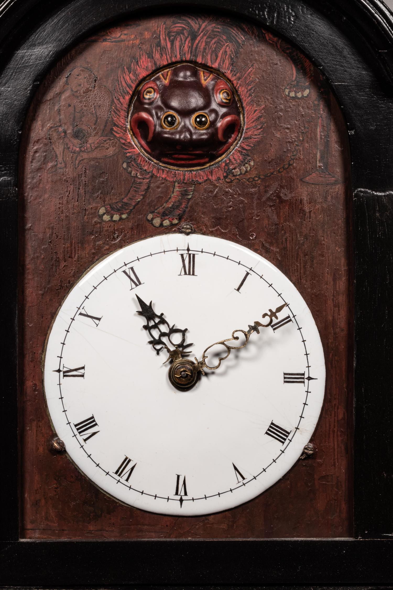 A Japanese Ebonized Cased Lantern Clock with Gourd-Form Weight