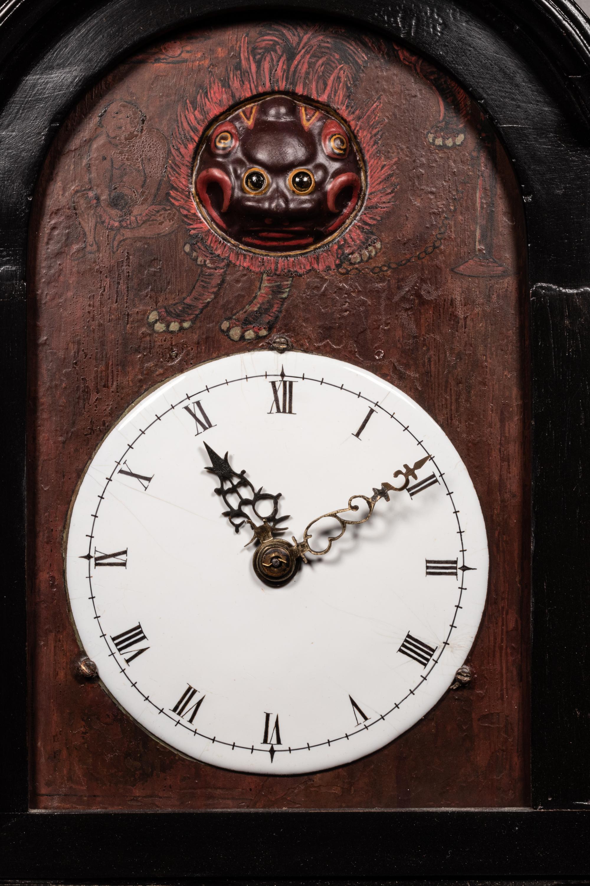 A Japanese Ebonized Cased Lantern Clock with Gourd-Form Weight