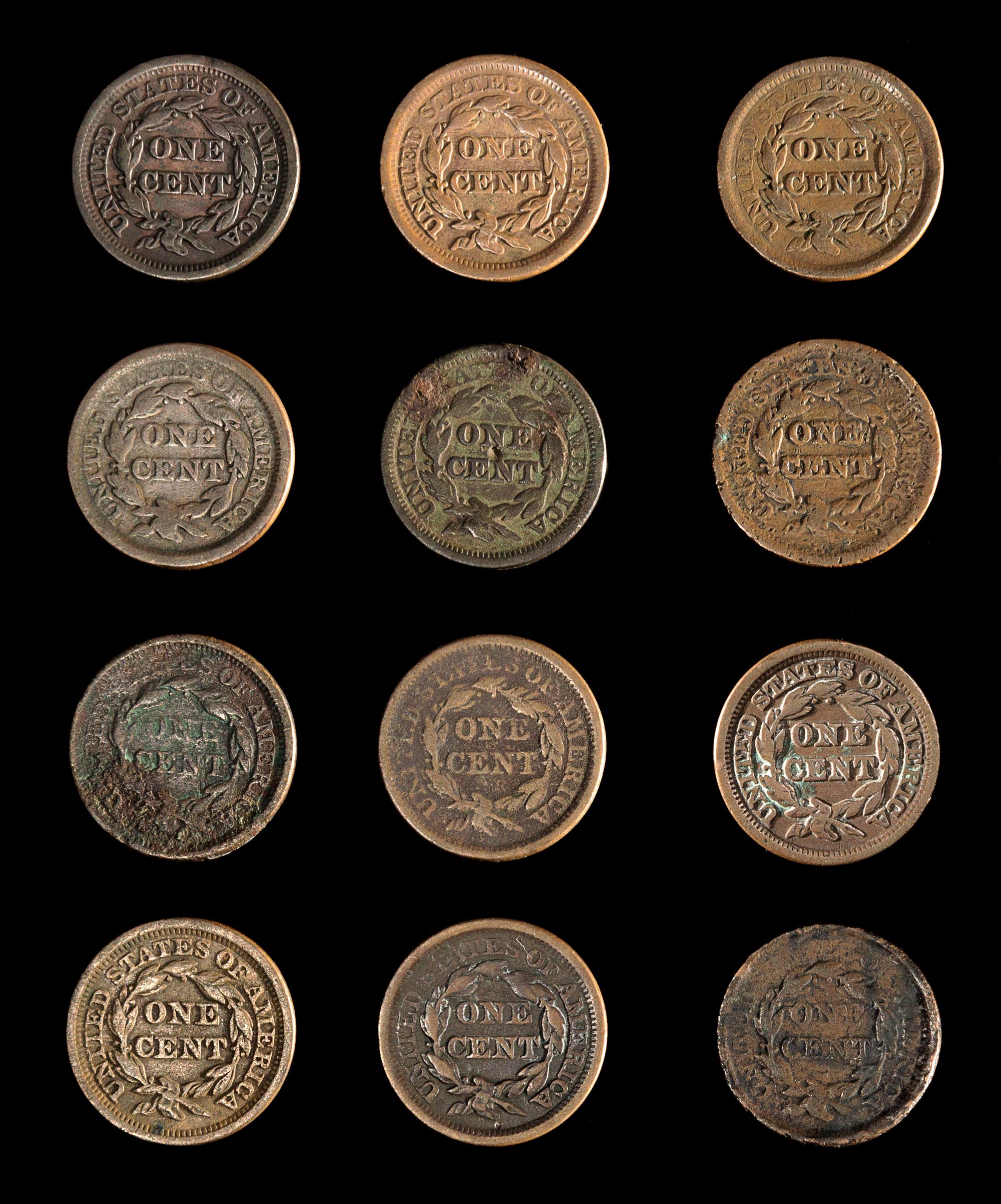 A Collection of Twelve United States Braided Hair 1c Coins