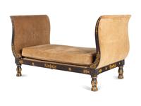 An Empire Ebonized and Parcel Gilt Daybed