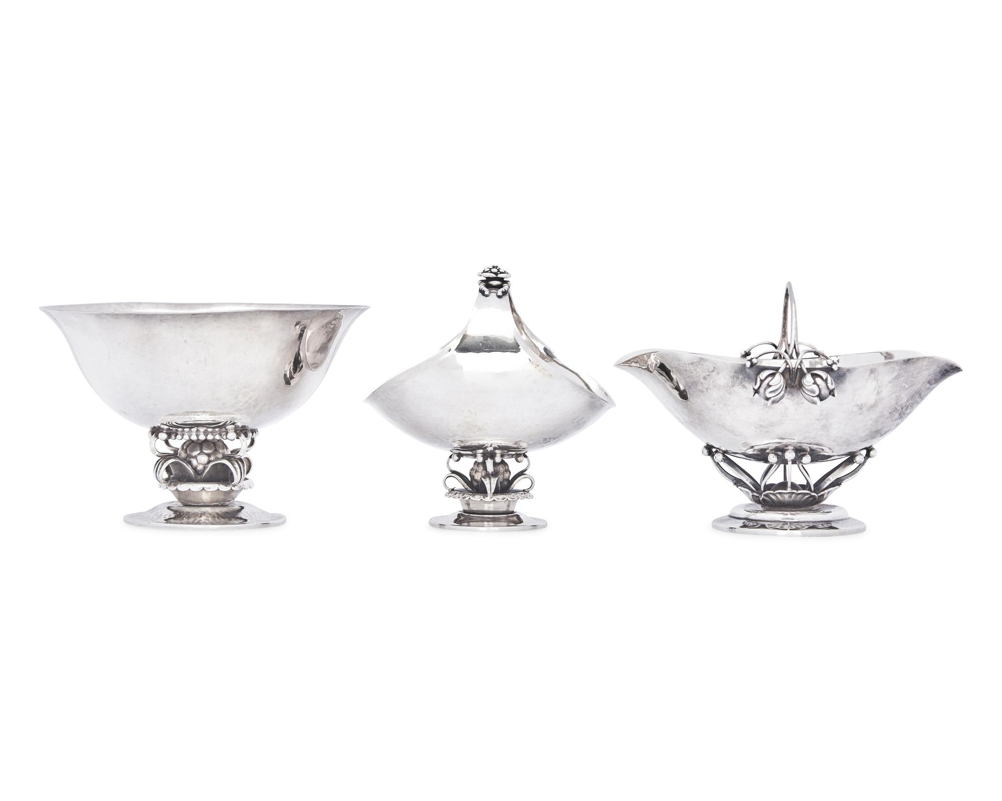 A Georg Jensen Silver Bowl and Two Sugar Baskets