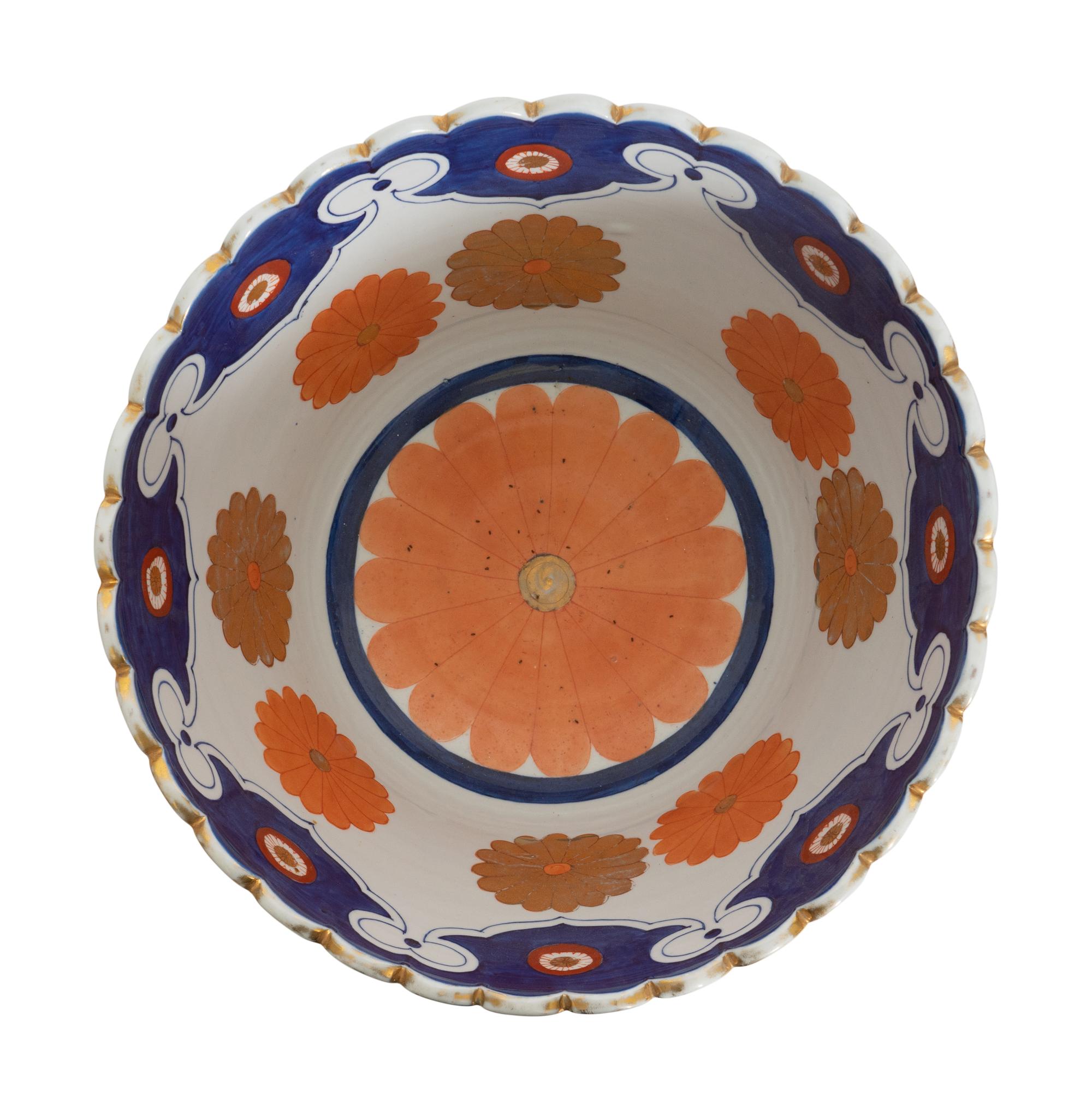 An Associated Pair of Large Japanese Imari Porcelain Punch Bowls