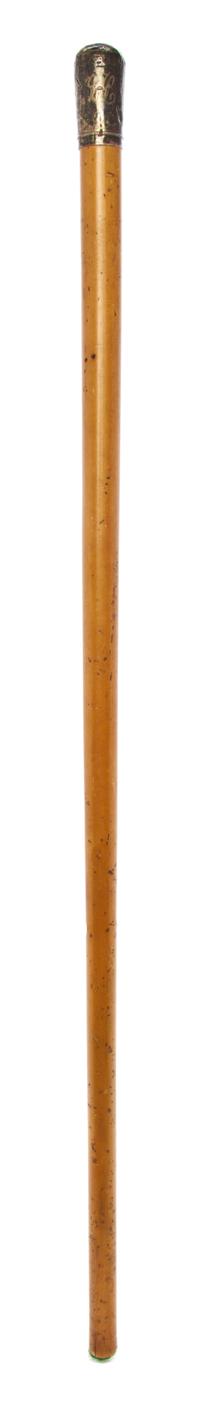 An English Silver Handled Walking Stick, Length of handle 2 1/4 x length overall 32 1/4 inches.