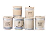 Six Stoneware Advertising Crocks
