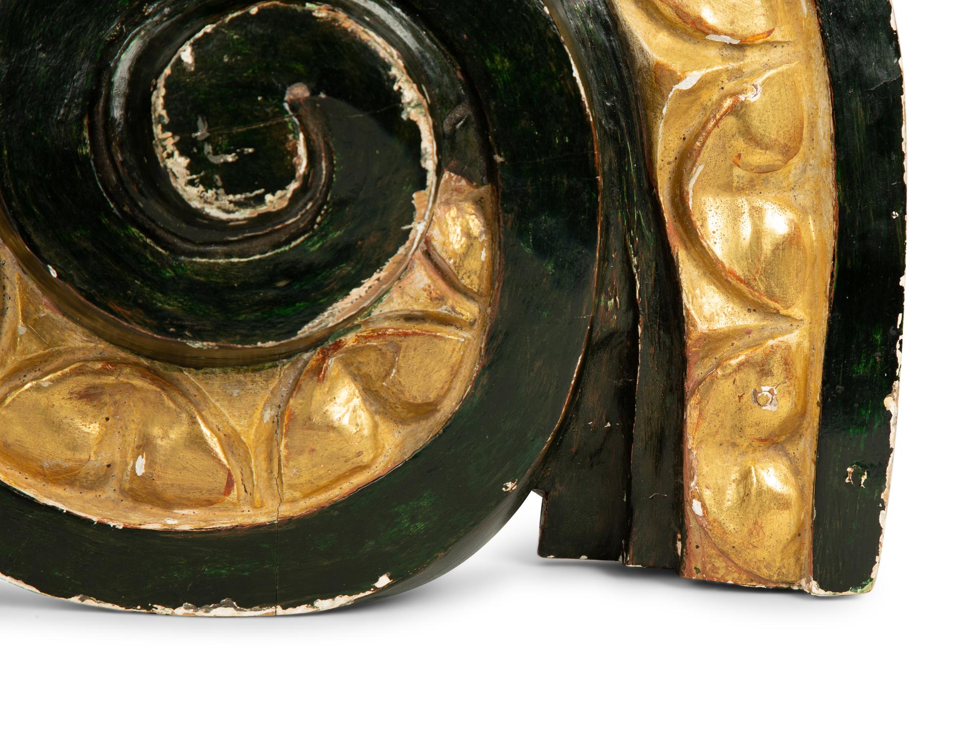 A Pair of Italian Painted and Gilt Volute Fragments