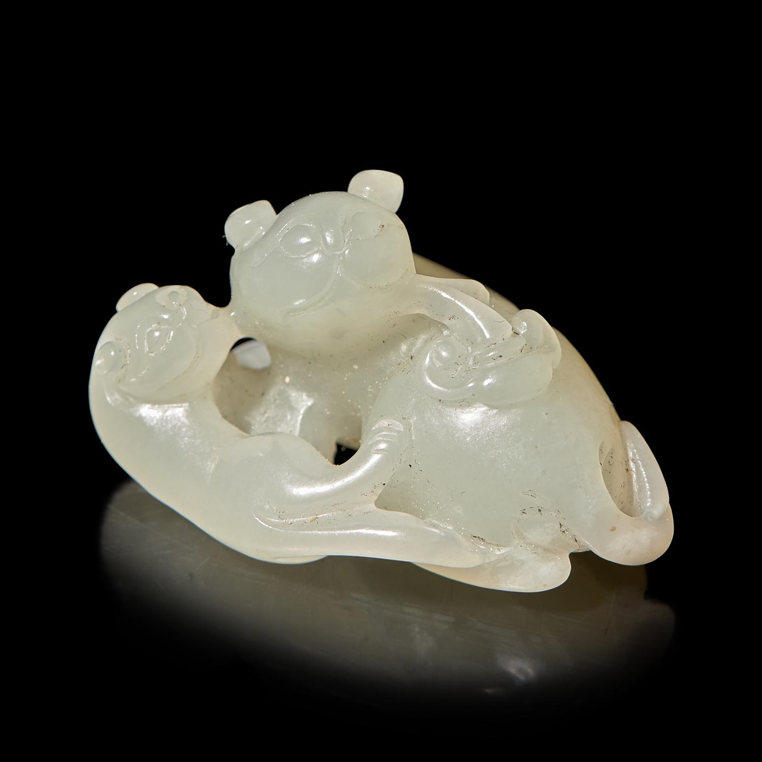 A Chinese Pale Celadon Jade ‘Double Badger' Group, Qing Dynasty — 清 青白玉雙歡珮