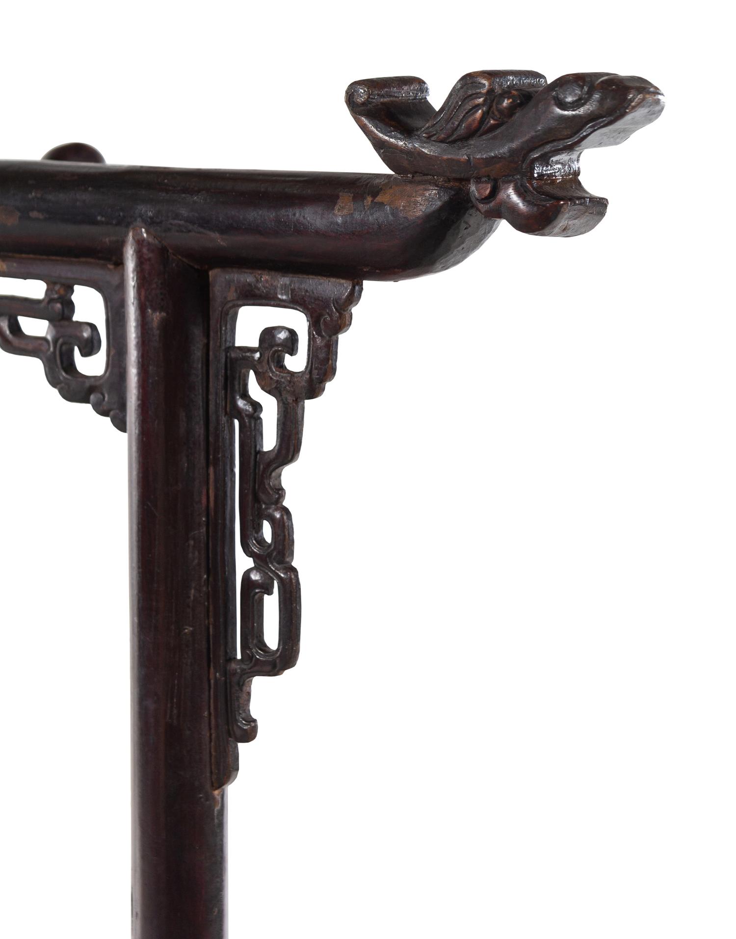A Chinese Brown Lacquered Softwood Cloth Rack