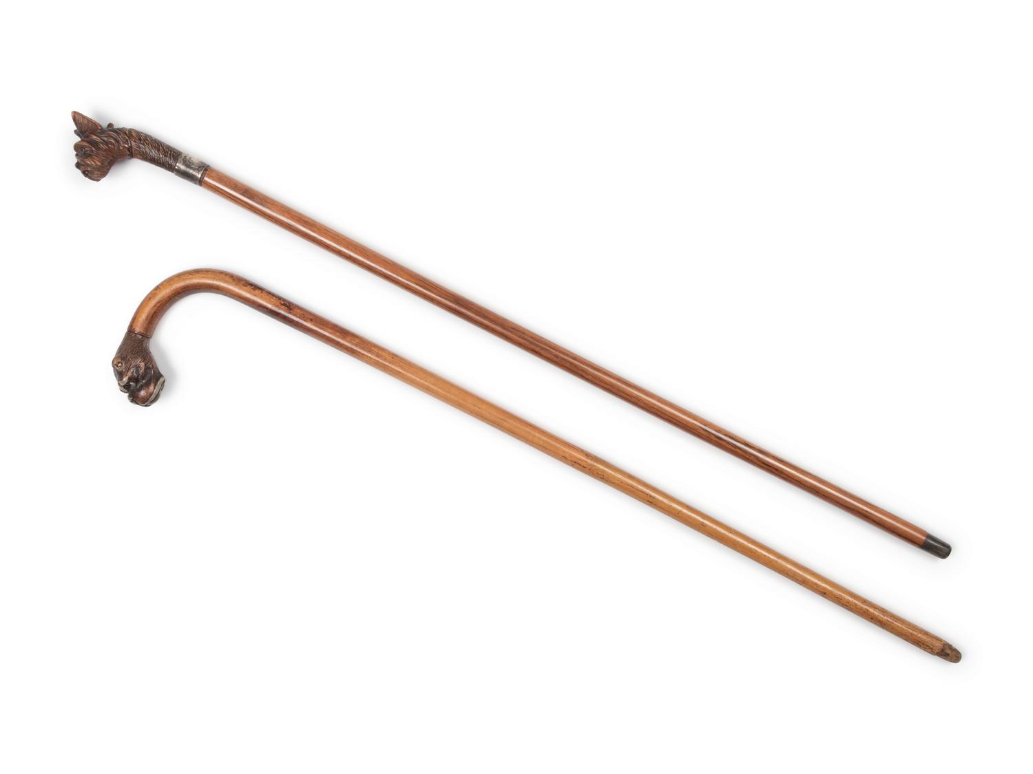 Two English Glass-Inset Carved Wood Dog's Head Canes