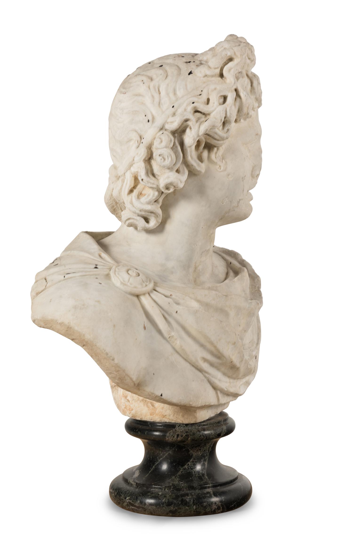 A Continental Carved Marble Bust of the Apollo Belvedere