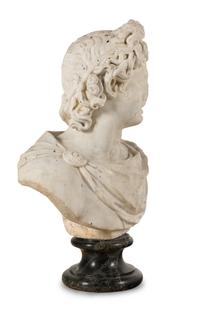 A Continental Carved Marble Bust of the Apollo Belvedere