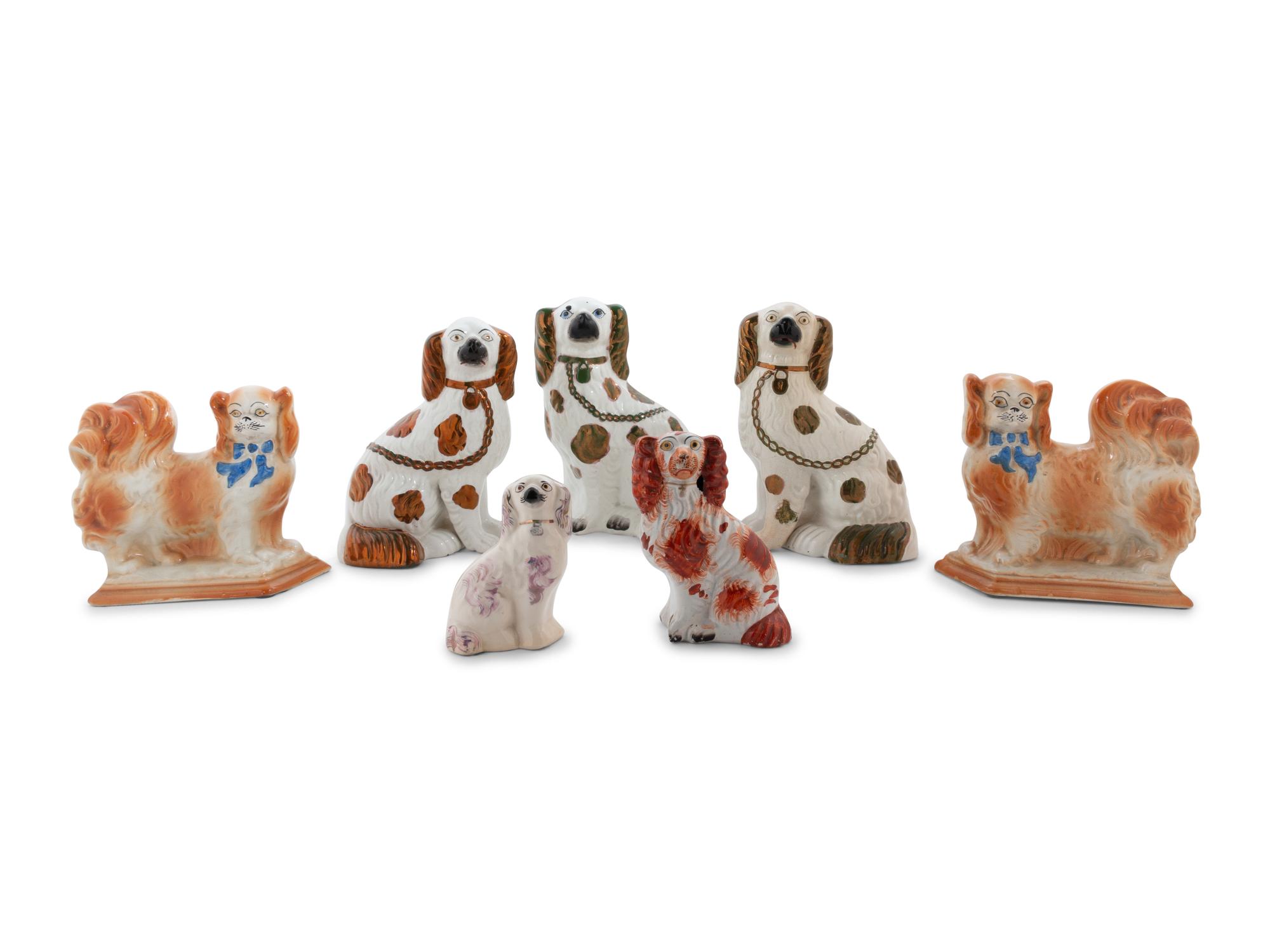 A Group of Fourteen Staffordshire Glazed Spaniels