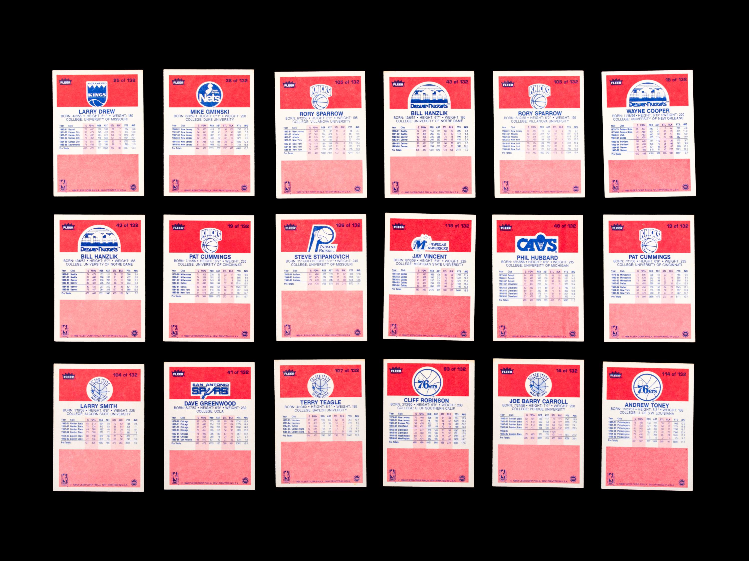A Group of 71 1986 Fleer Basketball Cards and Stickers (Including Julius Erving, Patrick Ewing, Magic Johnson and Hakeem Olajuwon)