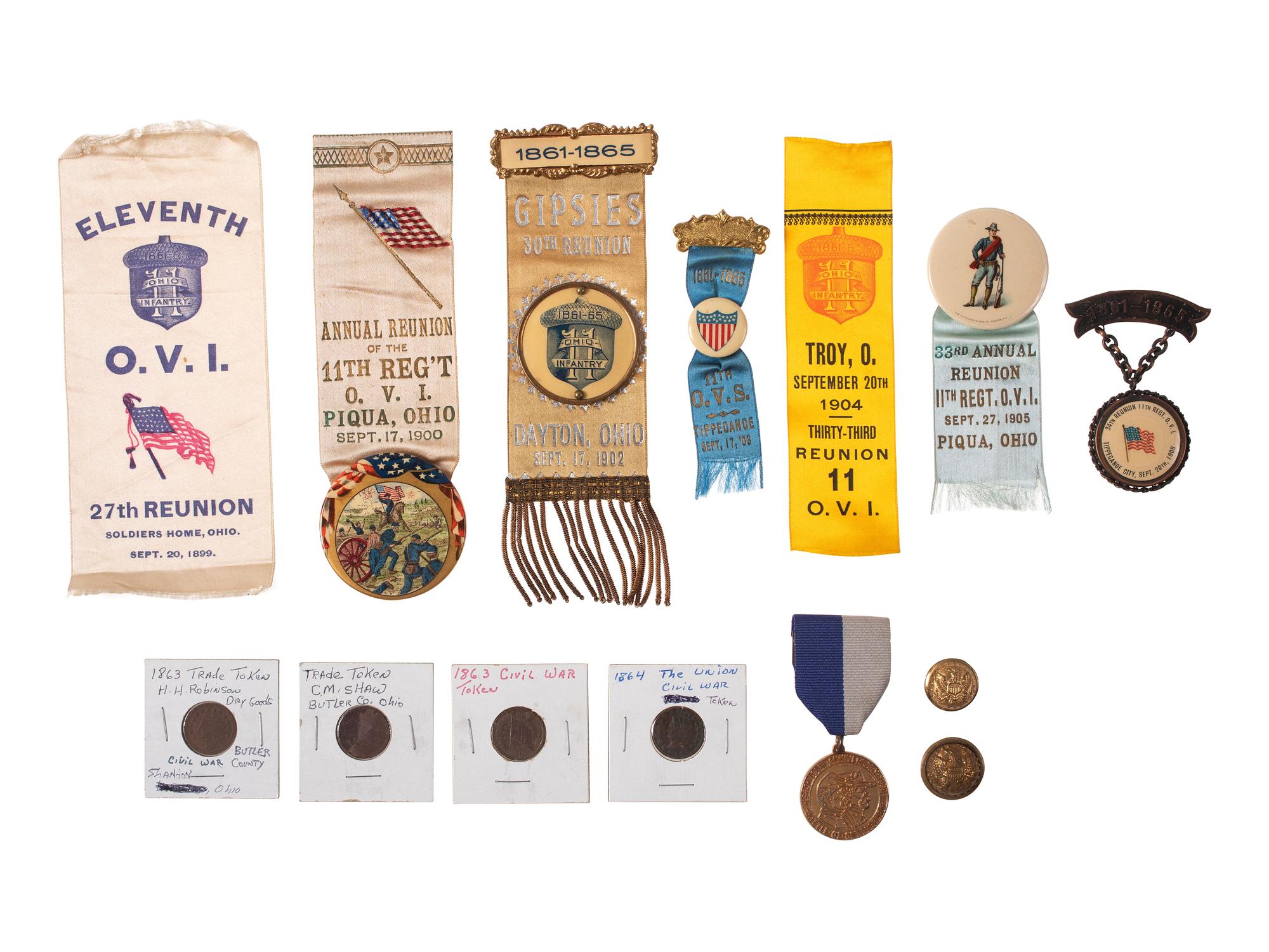 [CIVIL WAR]. GAR badges and ribbons, many 11th Ohio Volunteer Infantry, incl. IDed ladder badge.