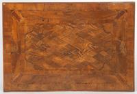A Continental Carved Parquetry Center Table
