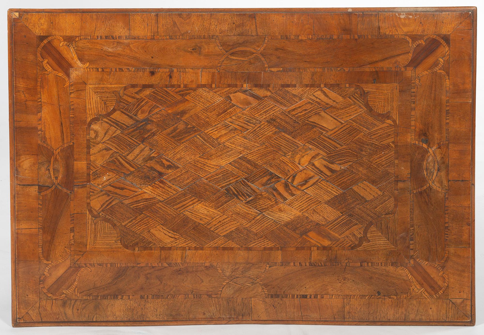 A Continental Carved Parquetry Center Table