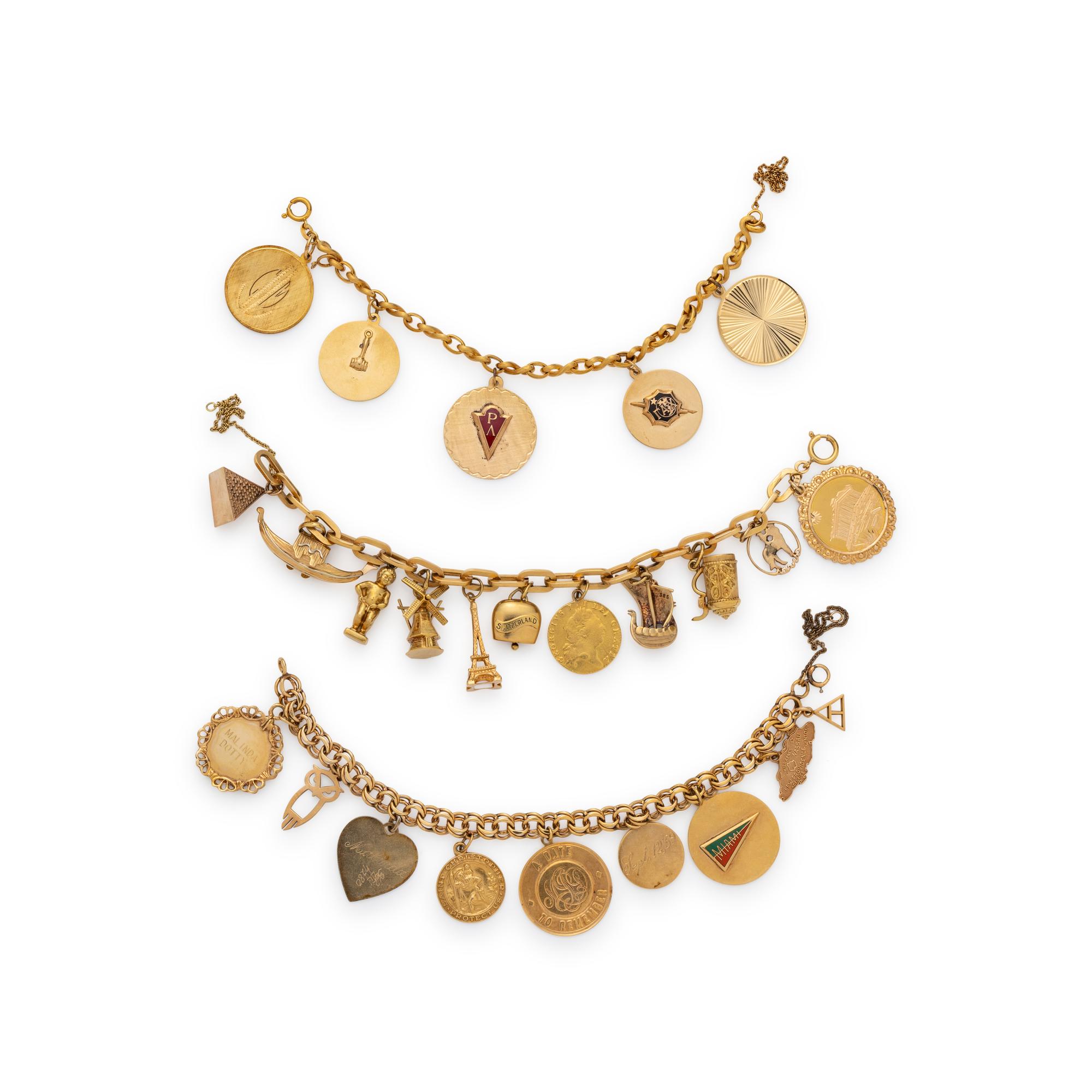 COLLECTION OF YELLOW GOLD CHARM BRACELETS