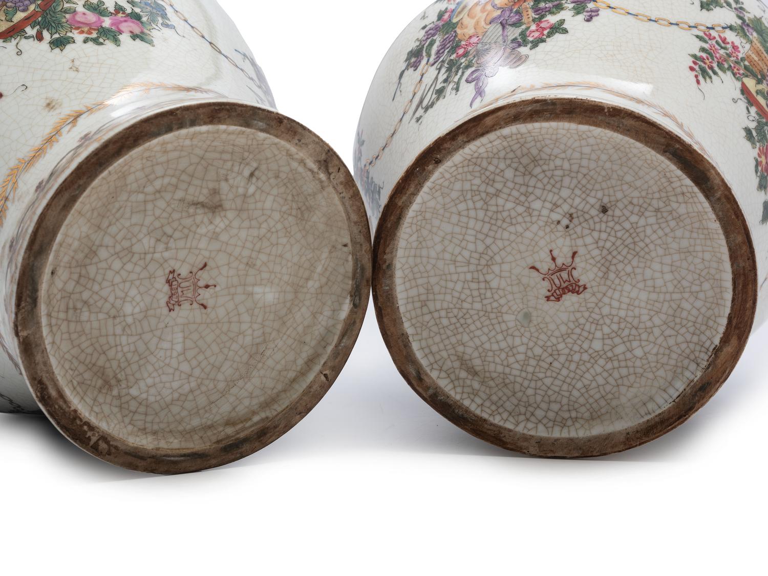 A Pair of United Wilson Gilt Metal Mounted Porcelain Urns