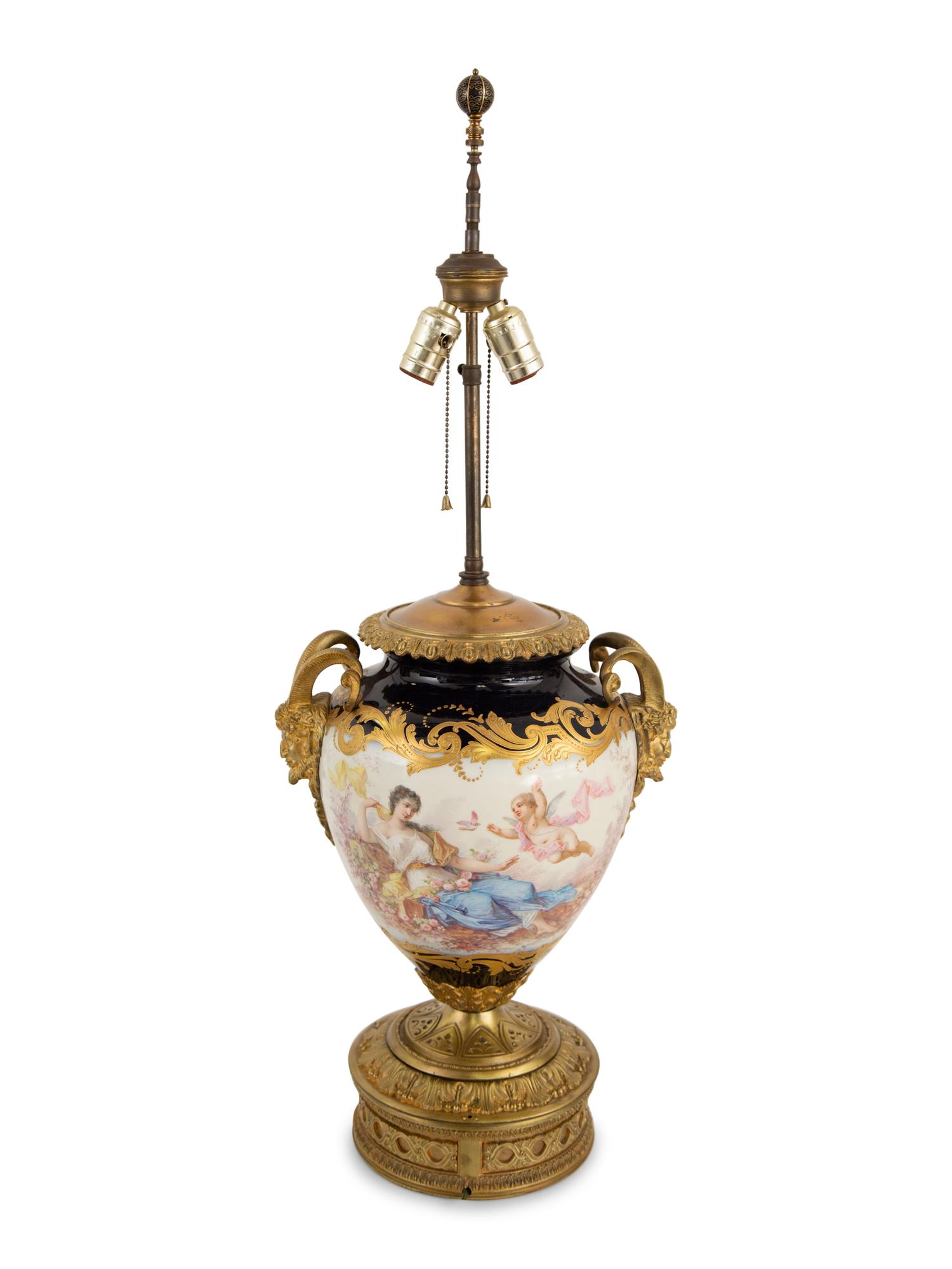 A Gilt Metal and Sèvres Style Porcelain Urn Mounted as a Lamp