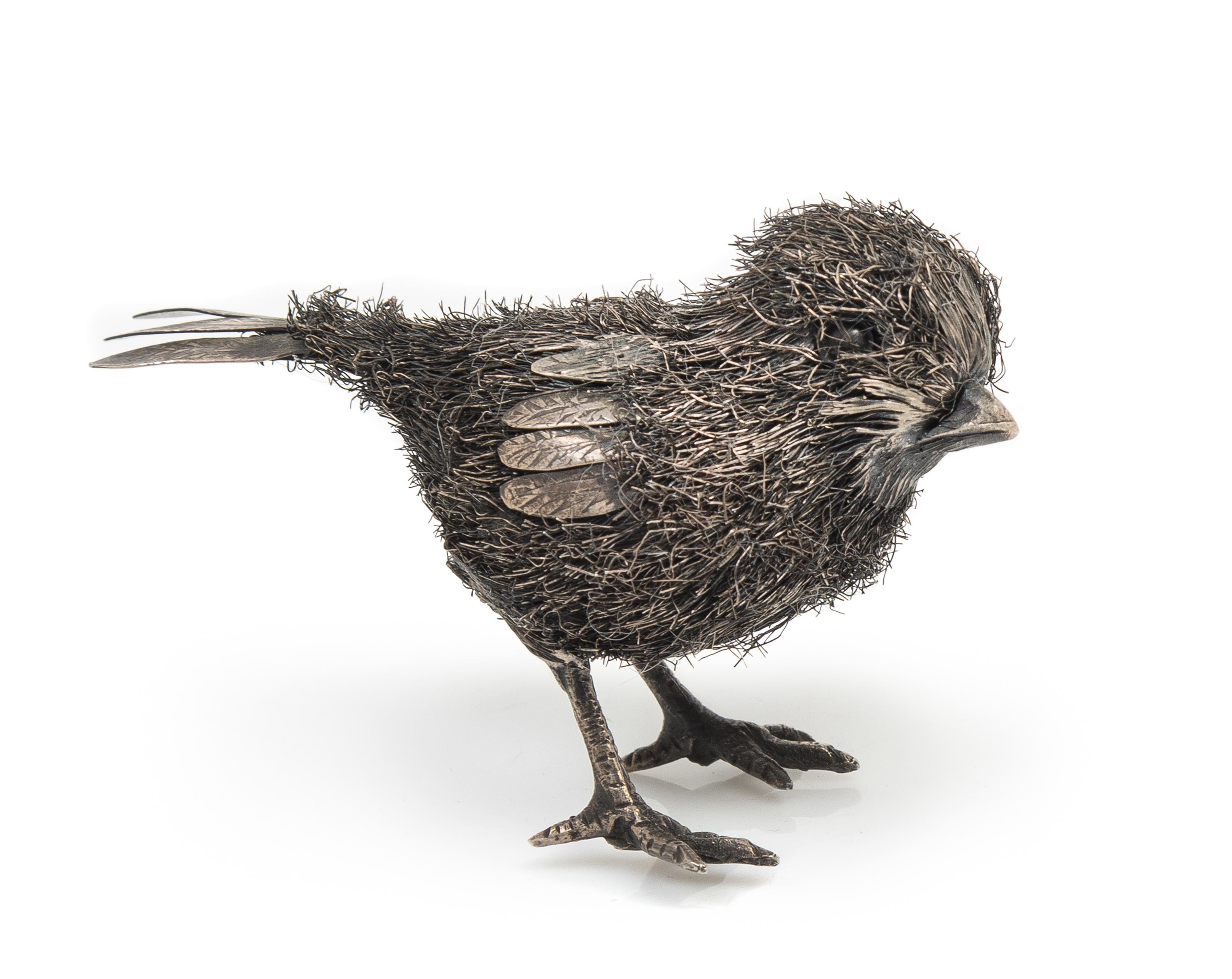 An Italian Silver Chick, Buccellati, Florence, 20th Century, the body formed of silver wire with a silver sheet wing and tail.