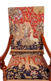 A Pair of Continental Carved Oak Upholstered Chairs
